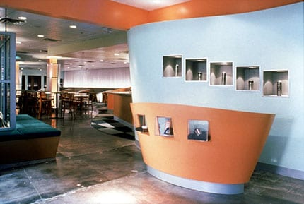 Curved interior commercial space with sculpted forms